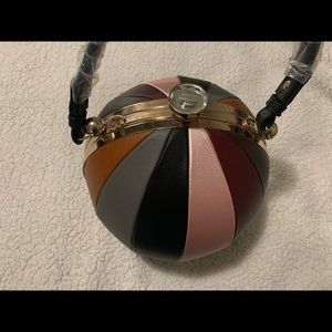 Basketball Handbag with “diamond” closure.